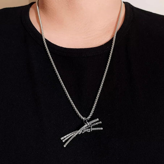 Fan wearing Zoro three-sword katana necklace. Best One Piece gift idea in Pakistan.