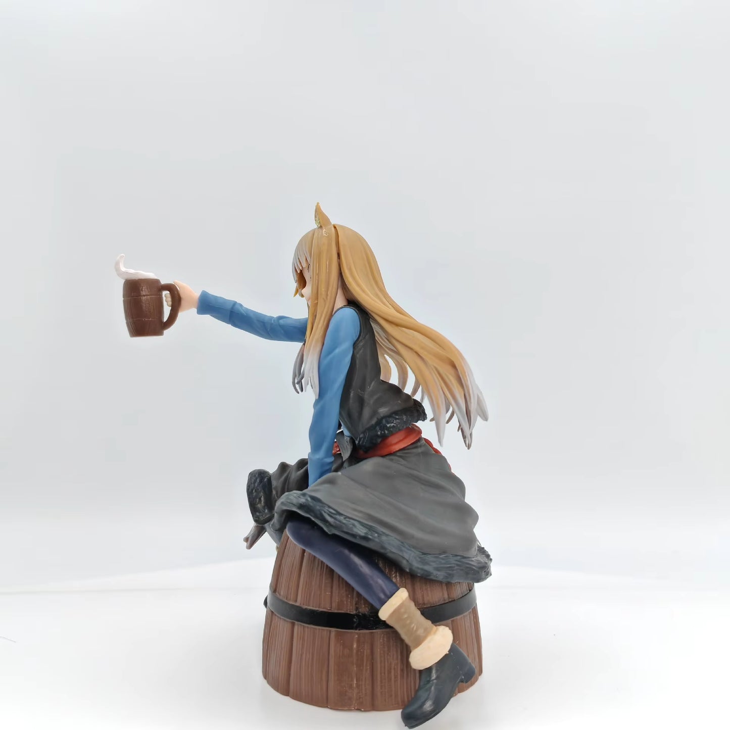 Spice and Wolf Holo Sitting on Barrel Figure