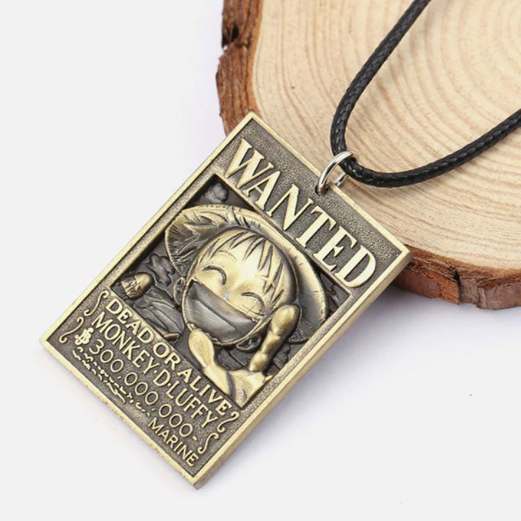 Close-up of One Piece Luffy bounty pendant necklace for anime fans